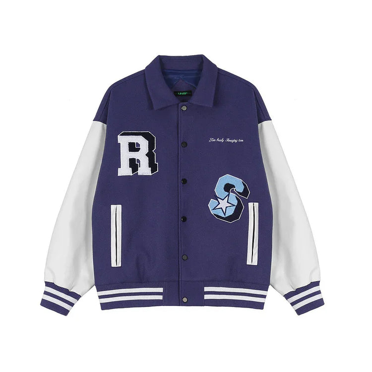 Purple and white varsity jacket with bold chenille patches, striped cuffs, relaxed fit.