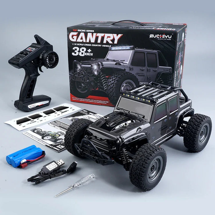 Black off-road RC truck with rugged tires, remote control, and accessories on display