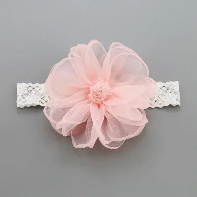Sheer pink flower headband with white lace elastic, soft and feminine hair accessory.