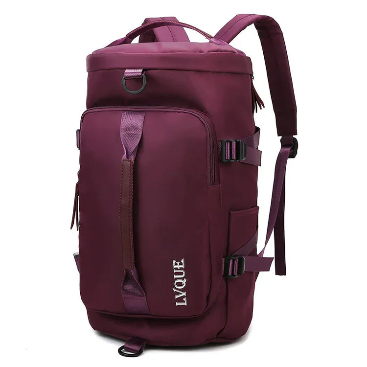 Burgundy backpack with adjustable straps, multiple pockets, and front zipper, durable fabric