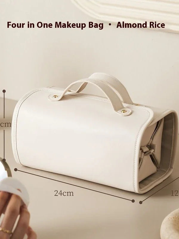 Cream-colored rectangular makeup bag with handles, faux leather material, structured fit, 24cm x 12cm.