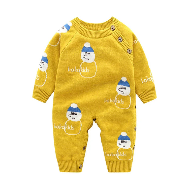 Yellow knit baby romper with cartoon face print, blue hat details, and button closure