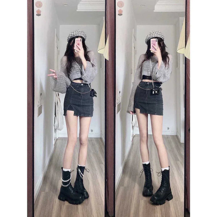 Woman wearing gray cropped sweater, black mini skirt, platform boots, and checkered beret in mirror selfie