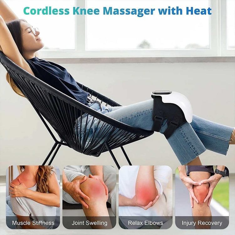 Woman in dark t-shirt and light denim jeans using a cordless knee massager at home.