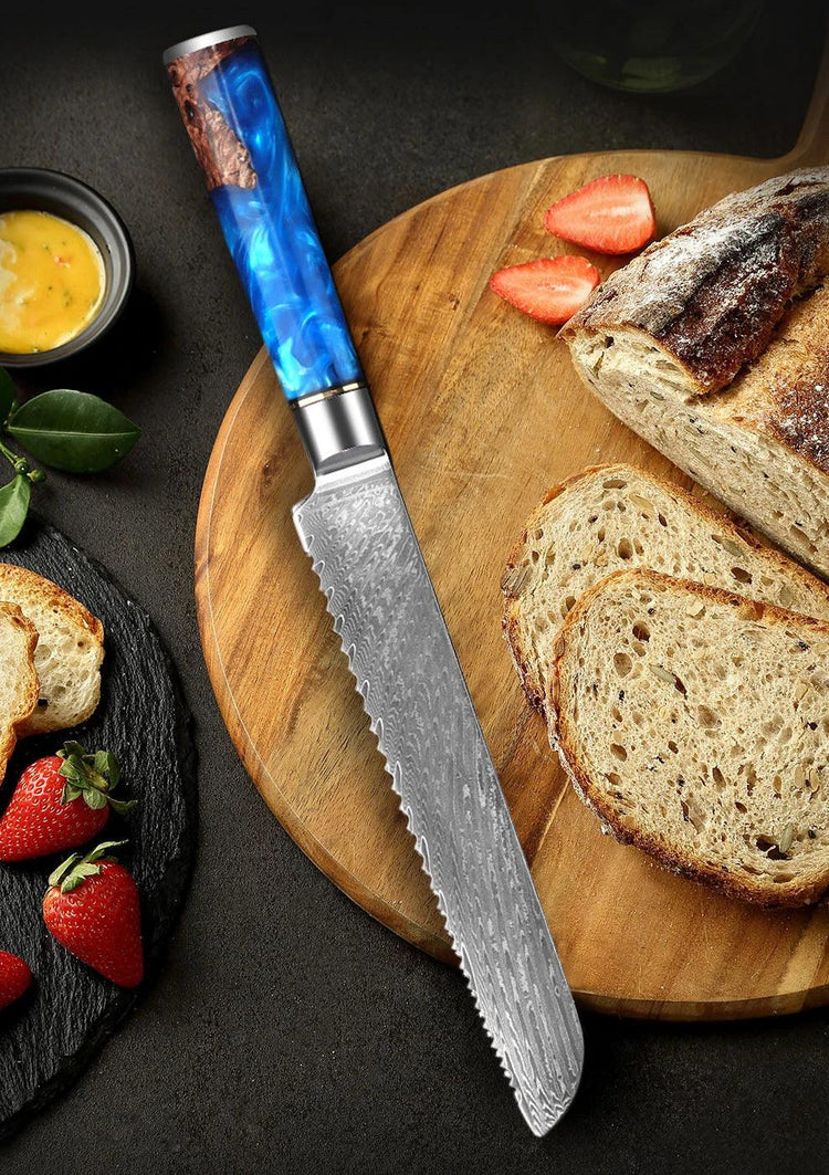 Serrated bread knife with blue resin handle on wooden board with sliced multigrain bread