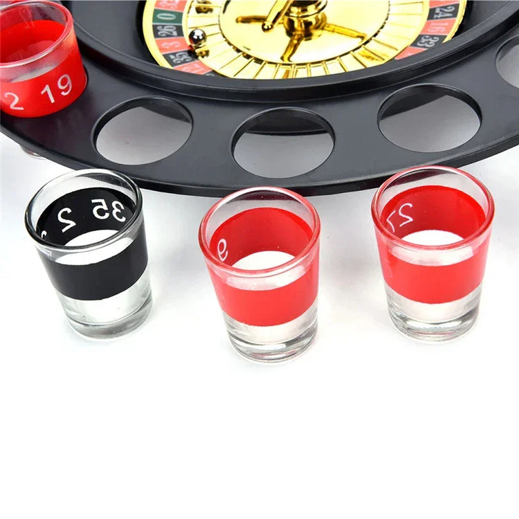 Roulette drinking game set with clear glass shot glasses in red and black bands