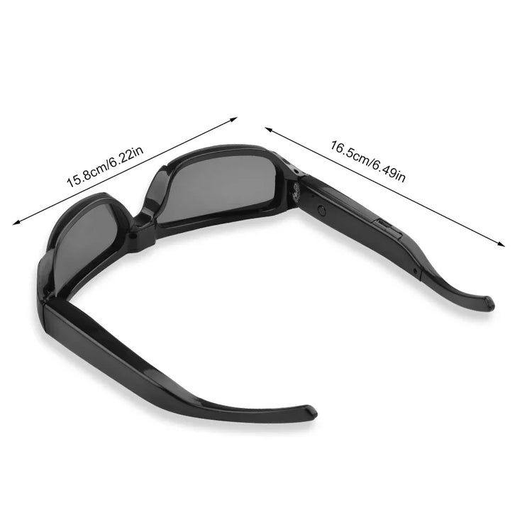 Black futuristic sunglasses with thick frame and dark lenses, measured in centimeters and inches
