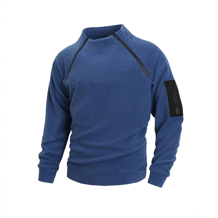 Blue fleece pullover with black zippered chest and sleeve pockets, relaxed fit streetwear