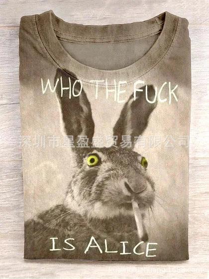 Folded beige graphic t-shirt with oversized rabbit print and bold text, relaxed streetwear fit