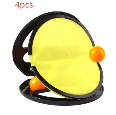 Set of four yellow and black paddle catch discs with two orange balls, plastic material