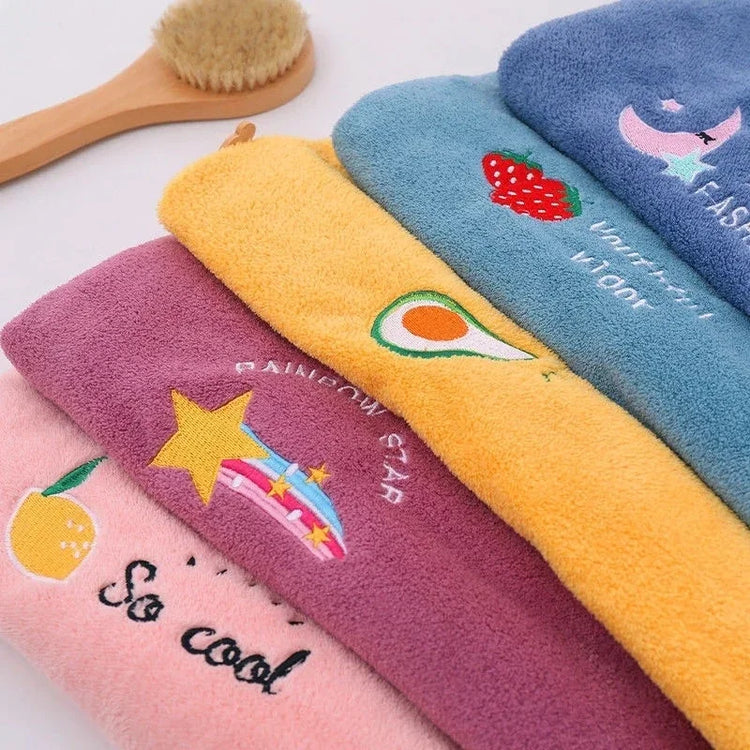 Colorful plush towels with embroidered fruit and star designs, soft fleece material, casual style