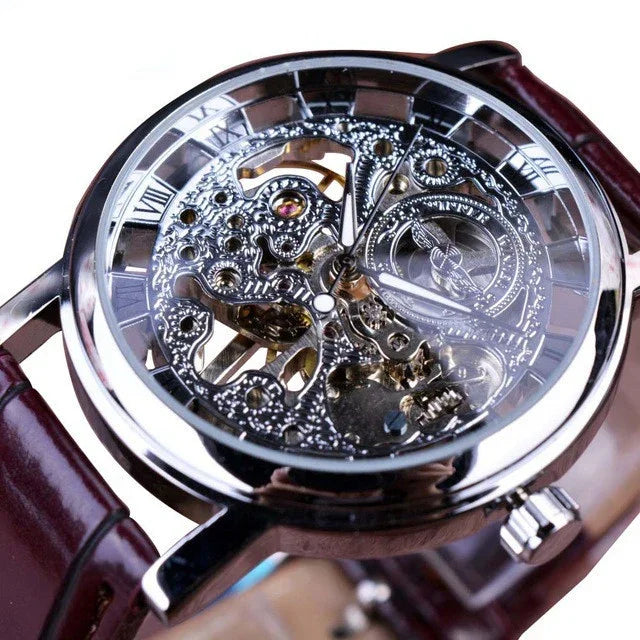 Skeleton dial mechanical watch with silver casing and brown leather strap, intricate gears visible.