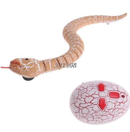 Beige remote control toy snake with cracked pattern and matching oval controller