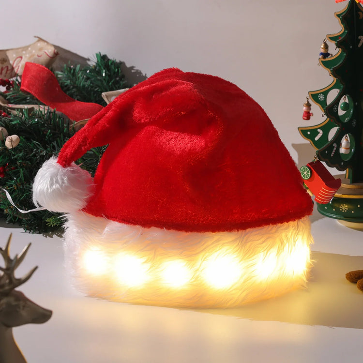 Red plush Santa hat with white faux fur trim and built-in LED lights, festive holiday decor