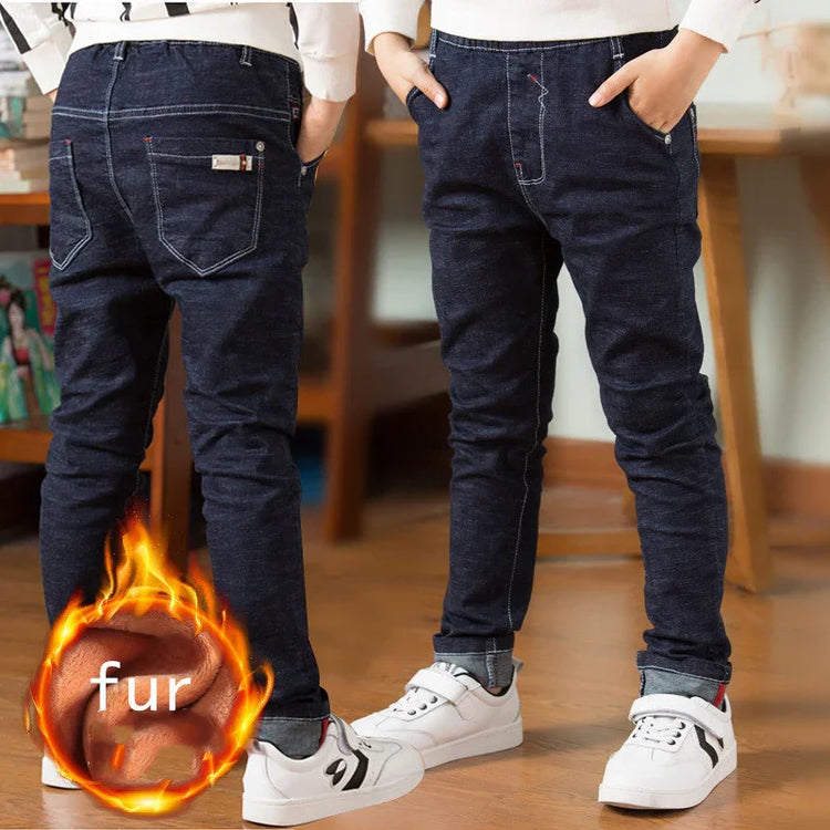 Kids wearing dark blue fleece-lined skinny jeans, casual fit, warm winter pants