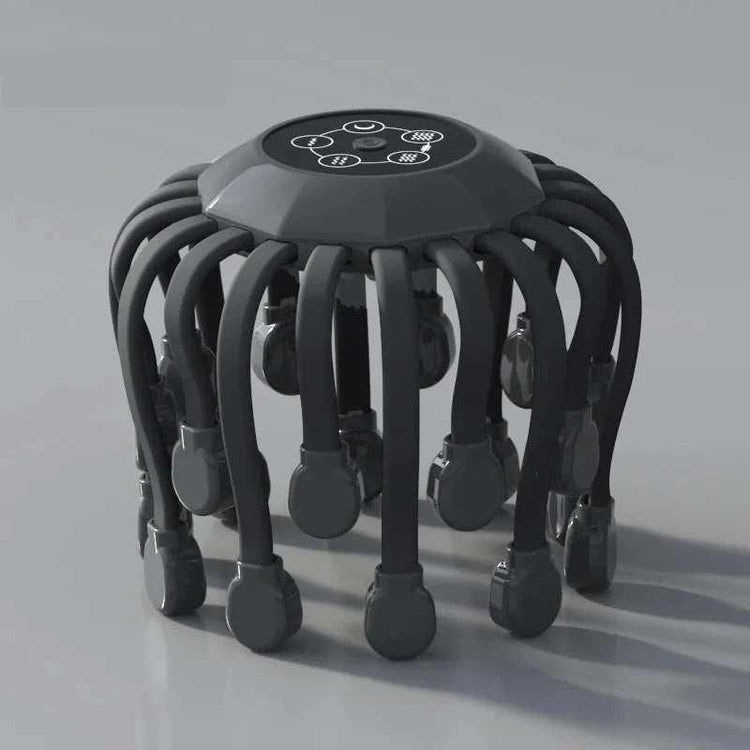 Futuristic black scalp massager with multiple flexible silicone arms on a gray background