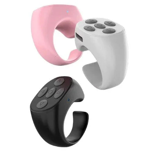 Three futuristic wearable rings with control buttons in pink, white, and black colors.