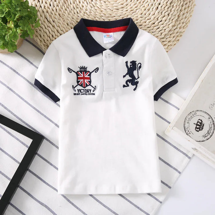 White short sleeve polo shirt with navy collar, embroidered crest, and lion patch, slim fit