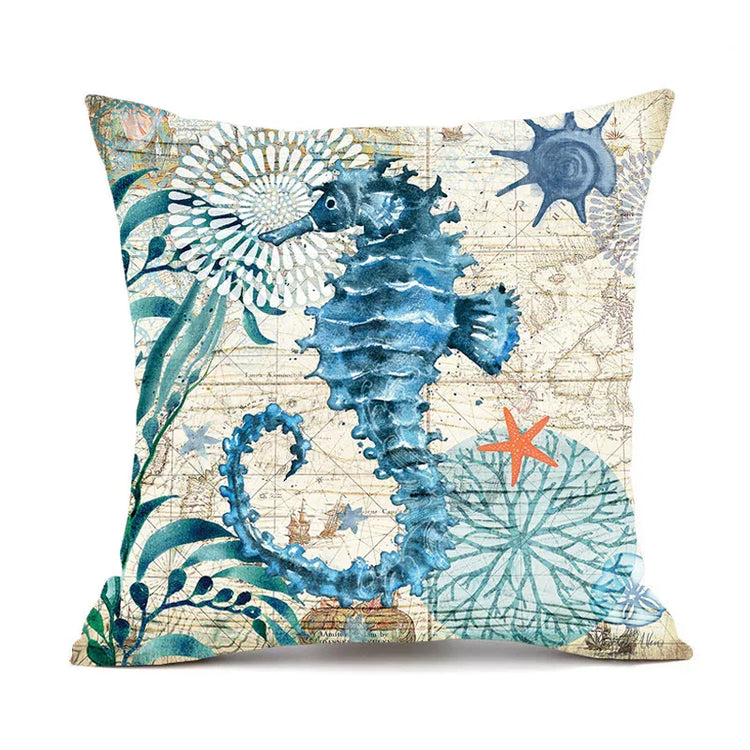 Throw pillow with blue seahorse and coastal plants on beige nautical map print, square shape