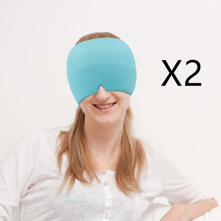 Woman wearing a light blue oversized sleep mask with soft fabric, relaxed fit, shown in a set of two.