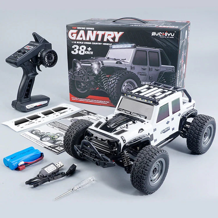 White remote control off-road car with large black tires, kit accessories, and packaging box