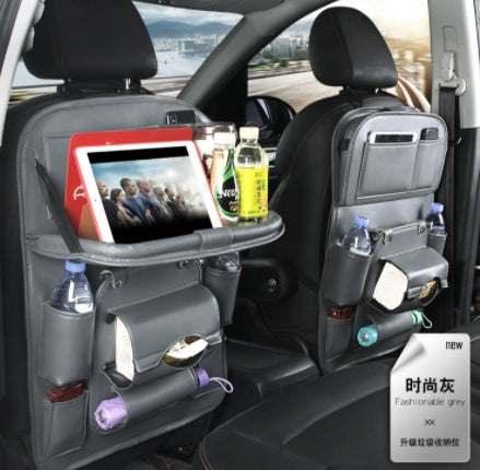 Gray leather car seat organizers with multiple pockets, drink holders, and tablet stand