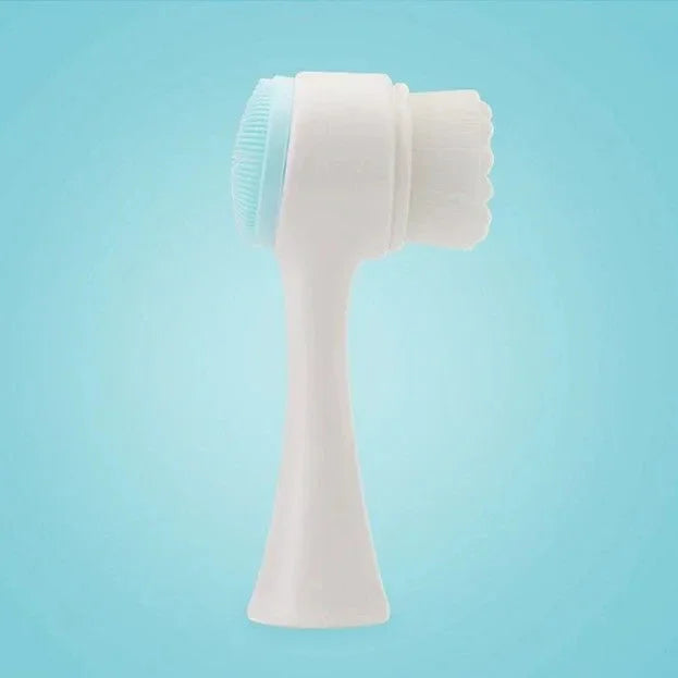 Dual-sided white facial cleansing brush with soft bristles and silicone scrubber
