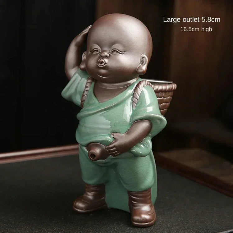 Ceramic figurine in green traditional-style clothing with a large basket and brown boots