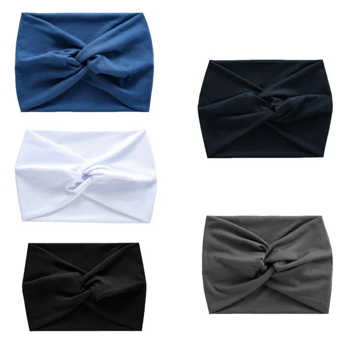 Five twisted knot headbands in blue, black, white, and gray cotton fabric.