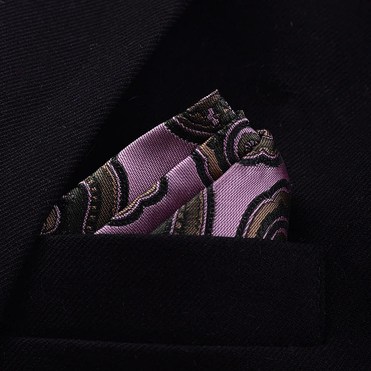 Purple paisley silk pocket square in black suit jacket pocket, elegant streetwear accessory