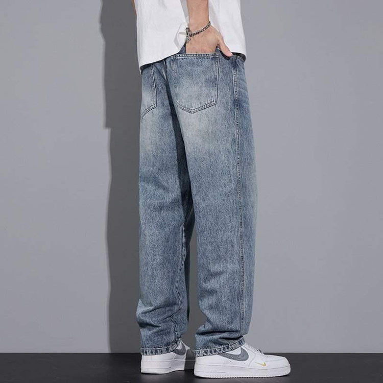 Loose fit light blue washed denim jeans, casual streetwear style, back view