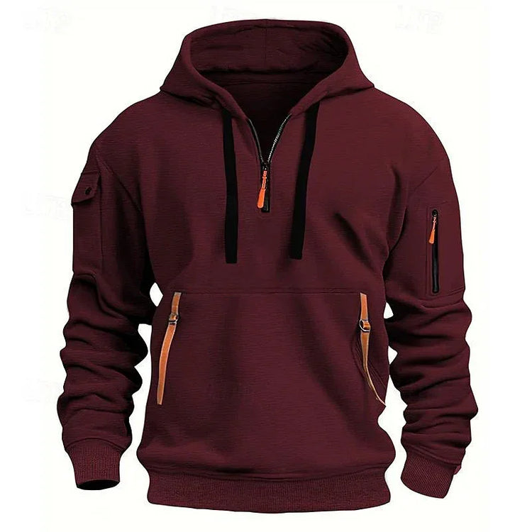 Burgundy streetwear hoodie with zip pockets, tech details, relaxed fit, cotton blend