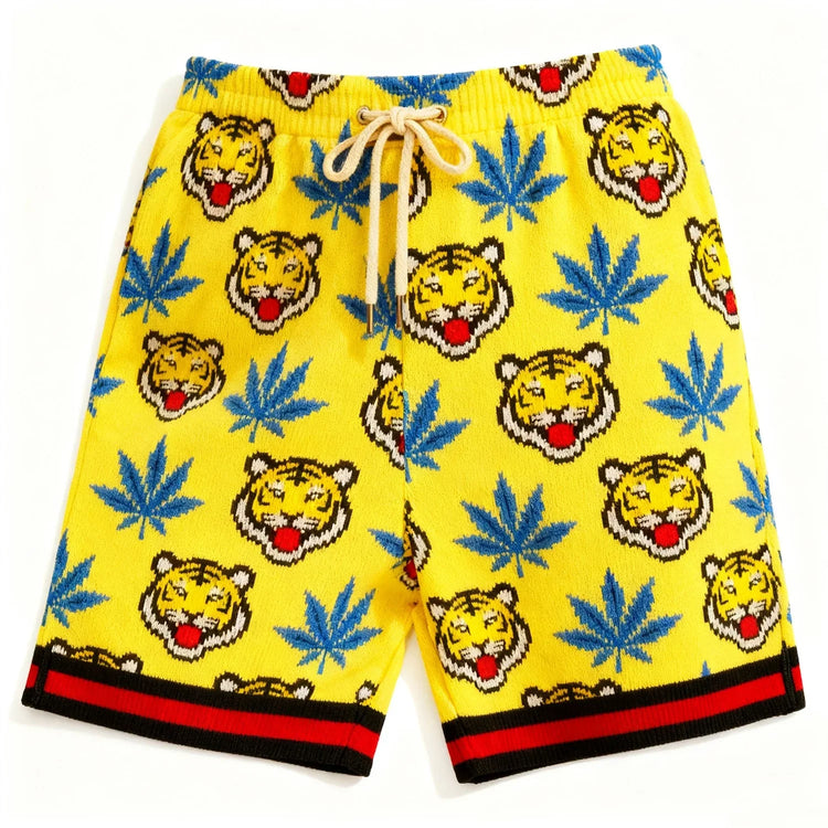 Yellow knit shorts with blue leaf and tiger head pattern, relaxed fit, red-black trim