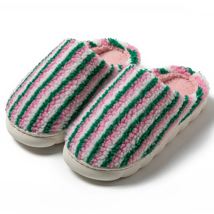 Cozy striped sherpa slippers in pink, green, and white with thick cushioned soles