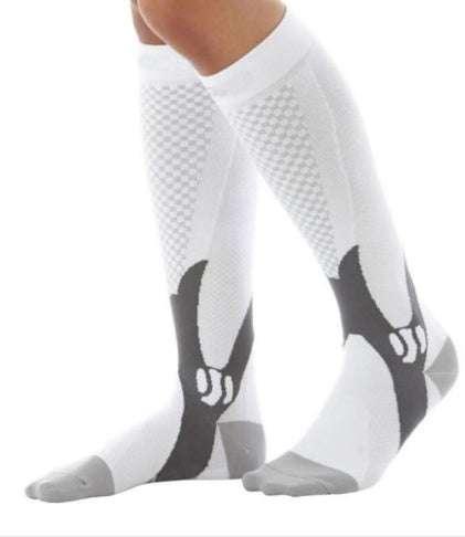 White knee-high athletic compression socks with black and gray accents, breathable mesh, snug fit.