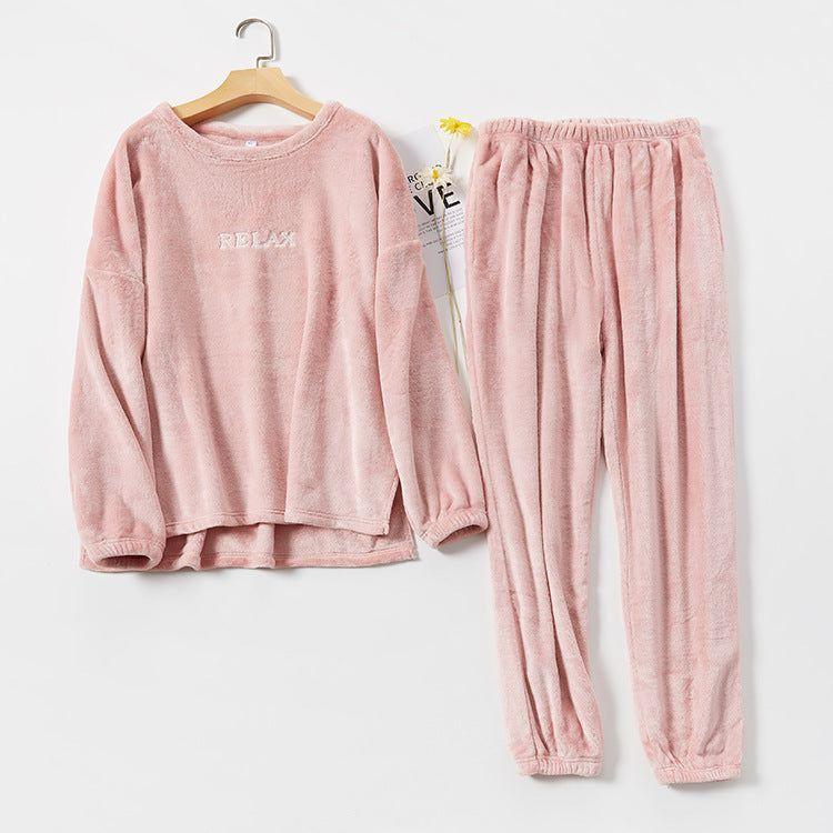 Soft pink fleece loungewear set with relaxed fit, long sleeves and elastic waist pants
