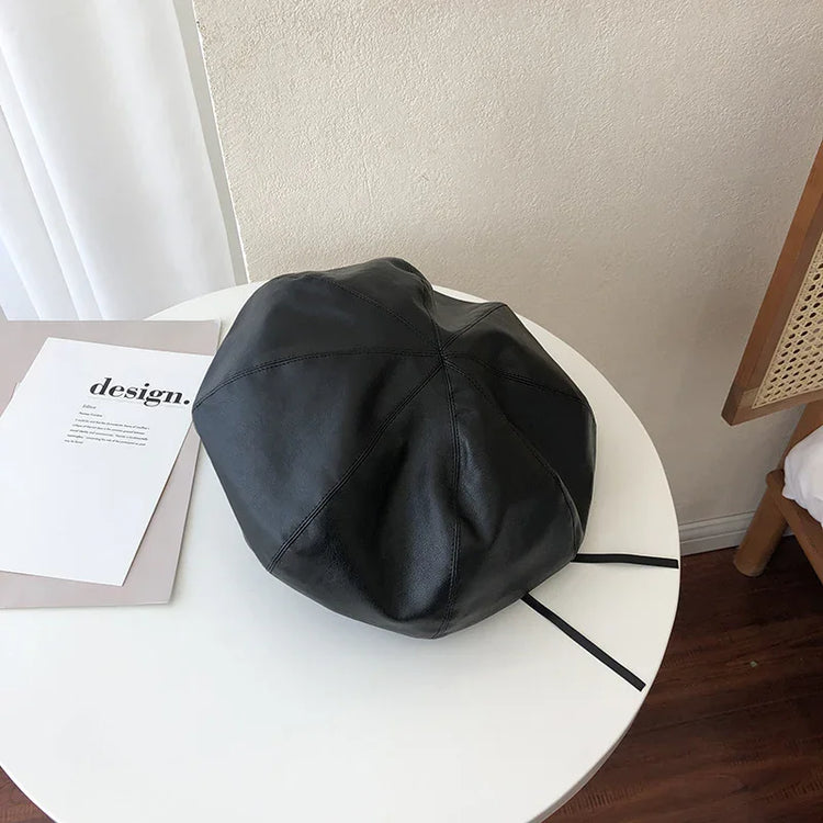 Black faux leather beret hat, modern streetwear style, soft material, relaxed fit