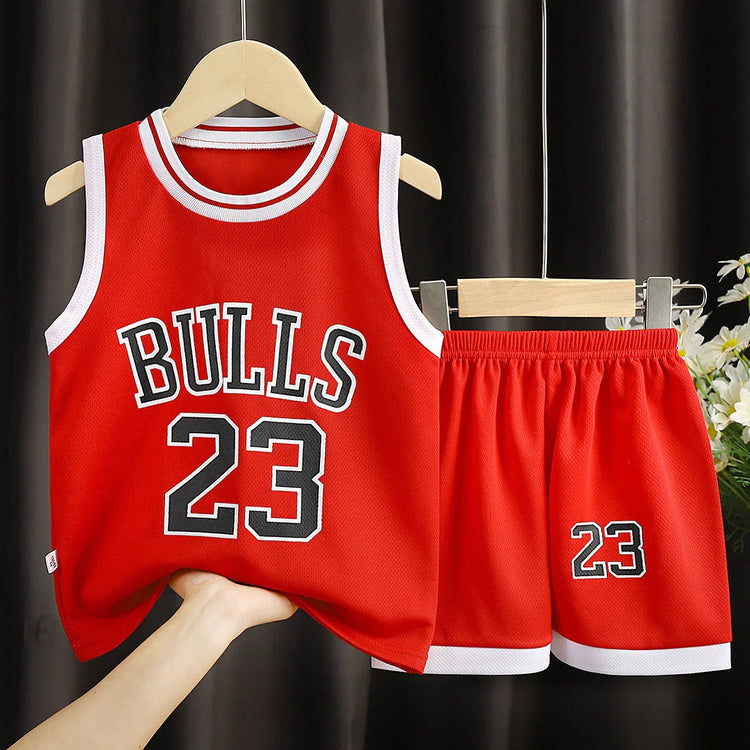 Red sleeveless mesh basketball jersey and shorts set with white trim and number 23.