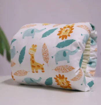 Colorful animal print baby diaper with giraffe, elephant, leaf and lion design, soft fabric.