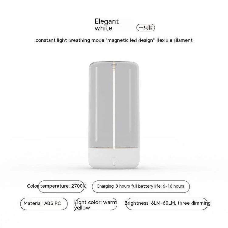 Minimalist white LED lamp with warm yellow light, ABS plastic, sleek cylindrical design.
