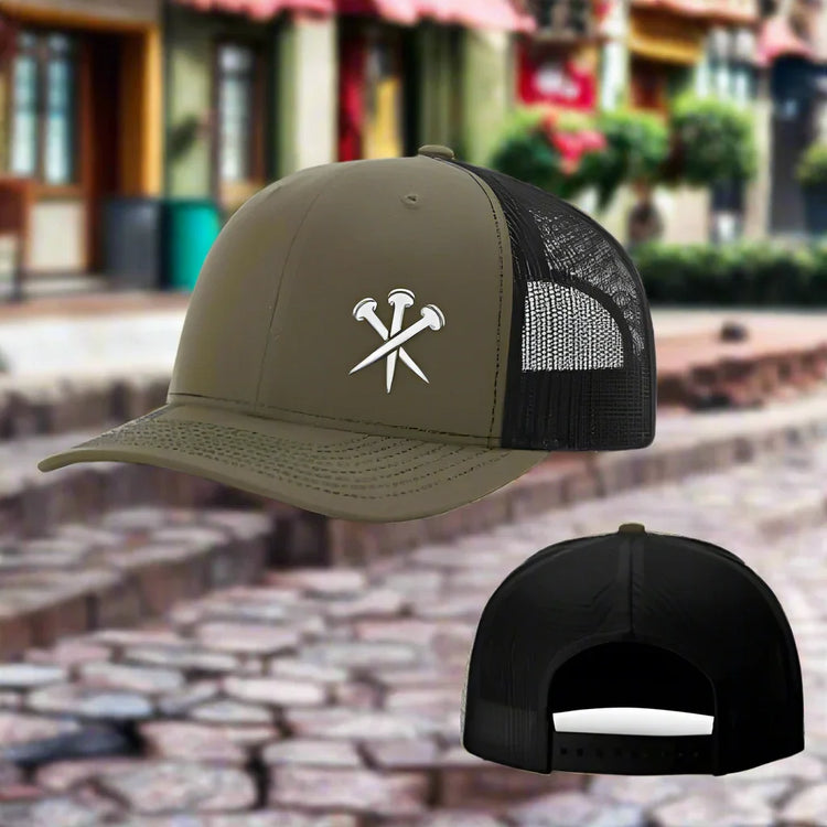 Olive green and black mesh trucker hat with embroidered nails graphic, adjustable fit