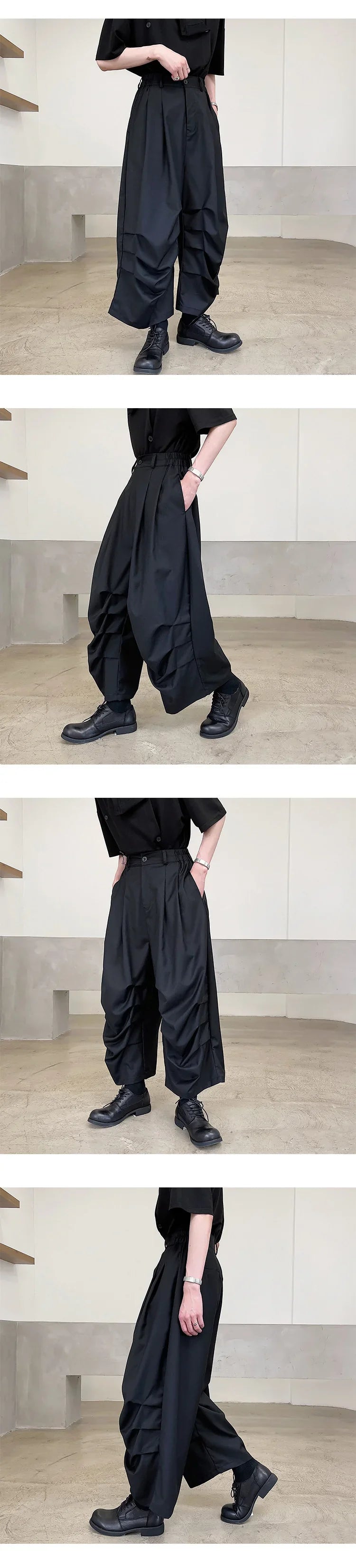 Loose fit black cargo pants with pleated details, wide leg style, lightweight fabric
