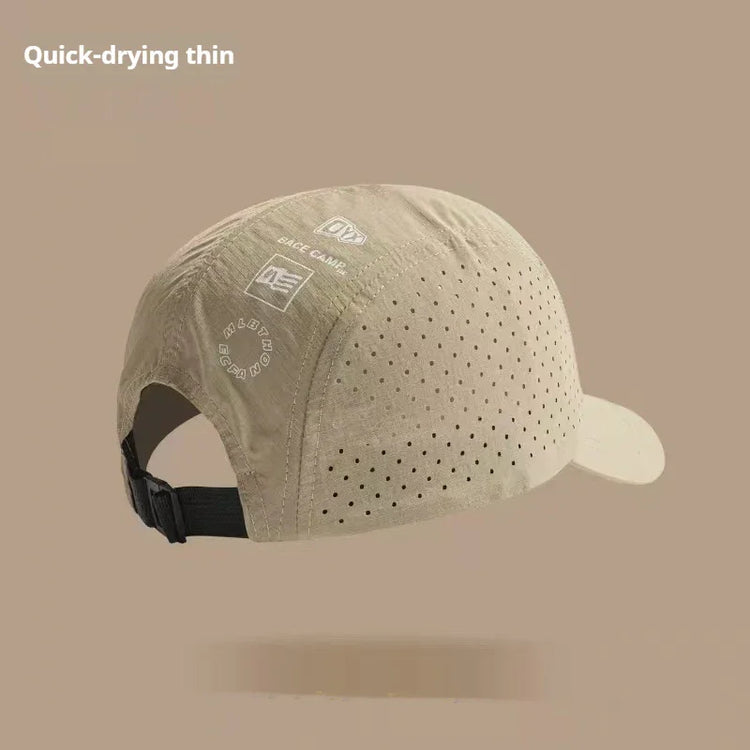 Beige quick-drying perforated cap with adjustable strap, lightweight breathable material.