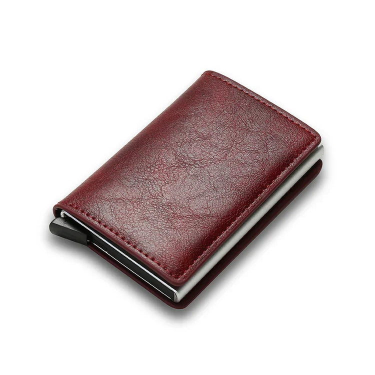 Slim burgundy leather card holder wallet with minimalist design and textured finish