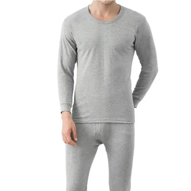 Man wearing grey thermal underwear set with long sleeves and fitted pants