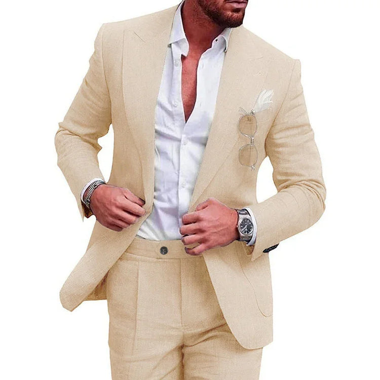 Men’s beige linen suit with tailored fit, styled with white dress shirt and pocket accessories