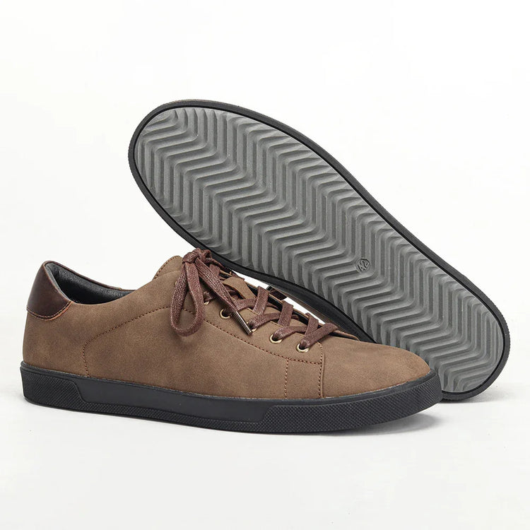 Brown suede low-top sneakers with dark rubber sole and lace-up closure, casual fit