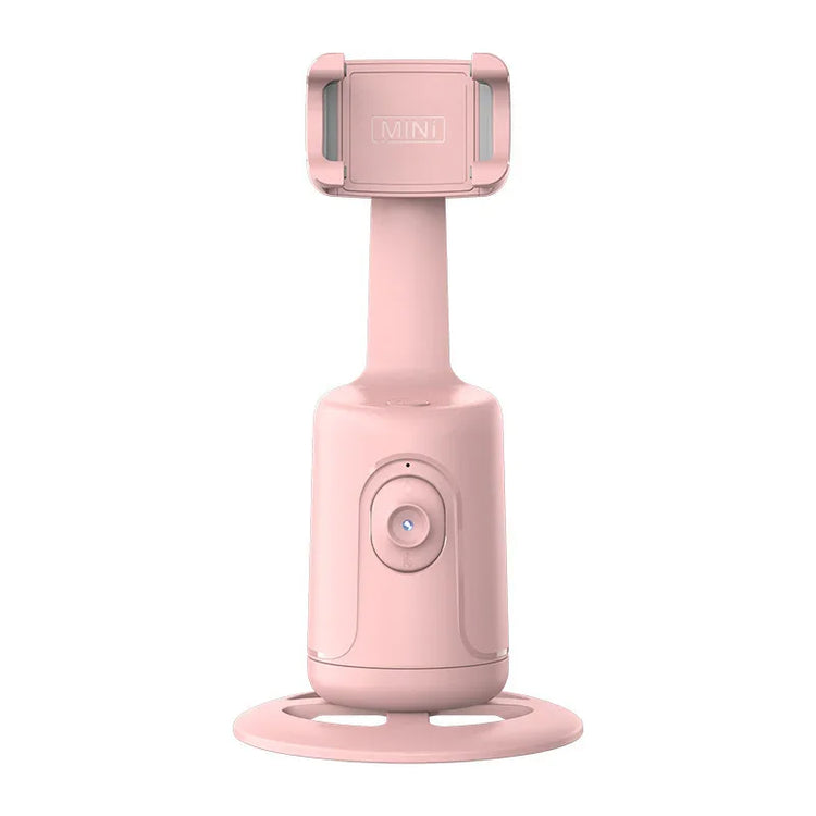 Pink automatic phone holder with adjustable clamp and round base, sleek modern design