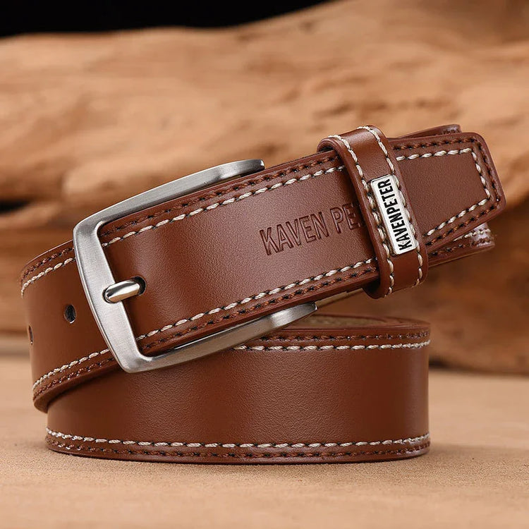 Brown leather belt with white stitching and silver buckle, casual modern style