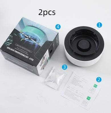 Set of two round black and white plastic ashtrays with packaging, instructions, and accessory packet.